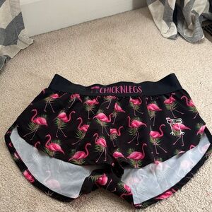 Women's flamingo CHICKNLEGS running shorts.